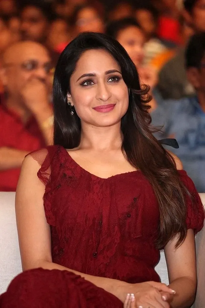 Pragya Jaiswal Stills At Telugu Movie Audio Launch In Maroon Dress